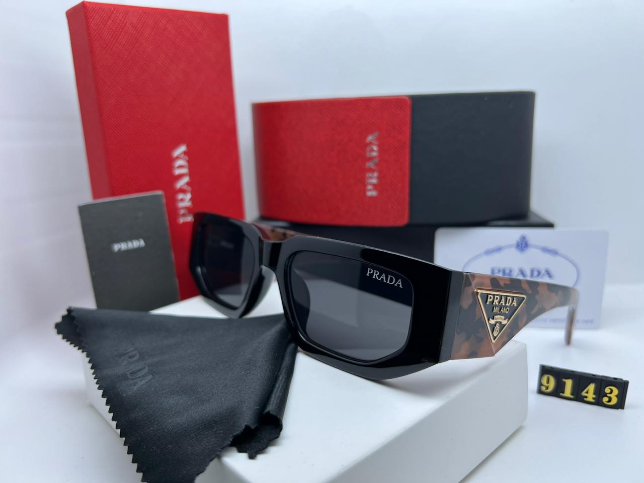 PRADA GLASSES